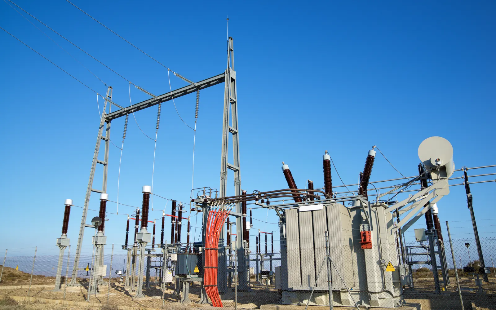 Electrical substation and transmission infrastructure representing critical OT environments