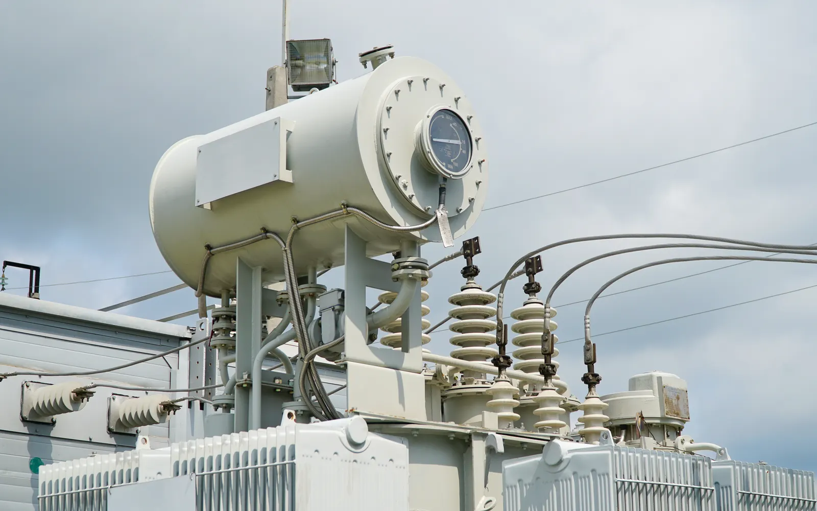 High-voltage transformer and disconnect switches at an electrical substation