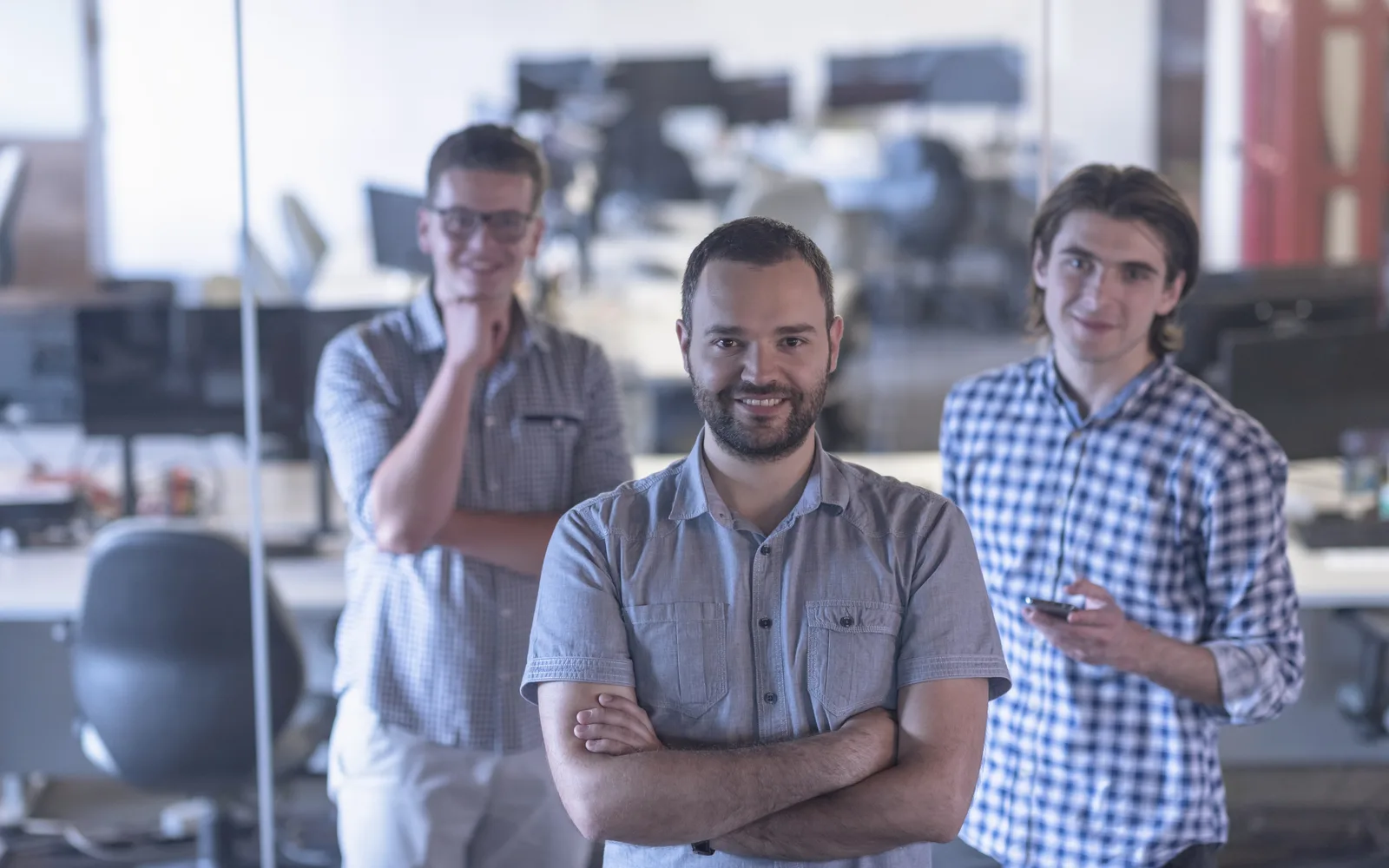 Security professionals collaborating in a modern office workspace