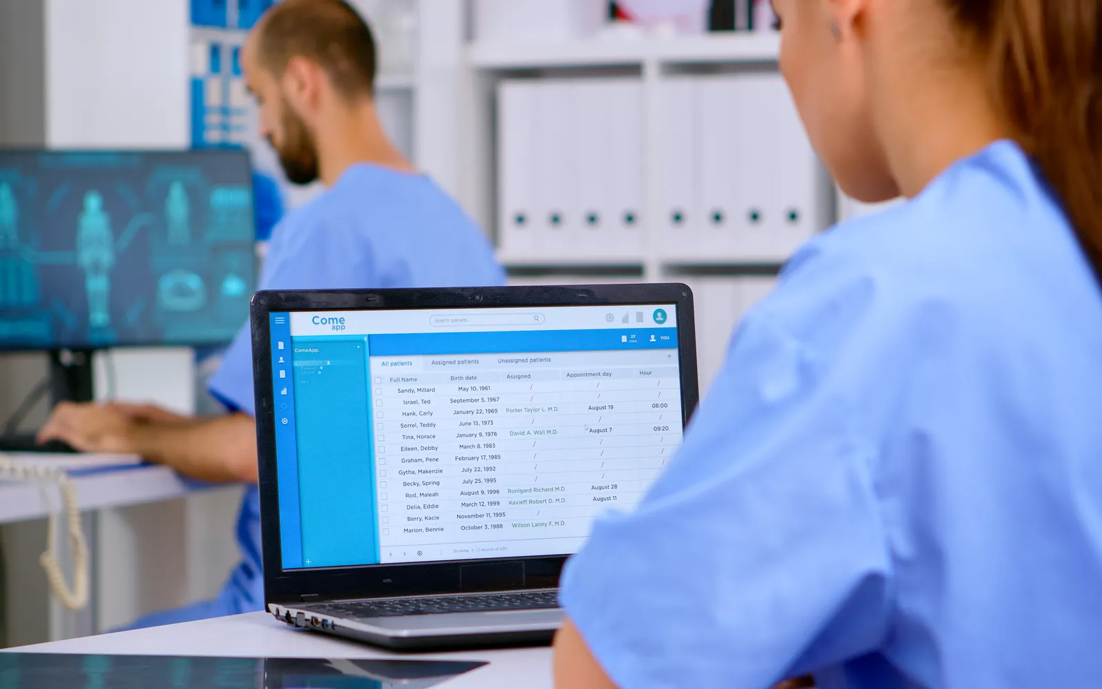 Clinician reviewing electronic medical records in a HIPAA security context